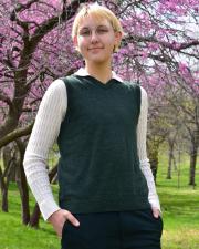 Quinton Dotzert standing in front of a cherry blossom tree